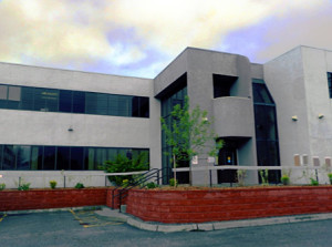 Landscaping facelift, before and after. Up- grade work to the exte- rior of the Anchorage building resulted in a marked increase in interested tenants.